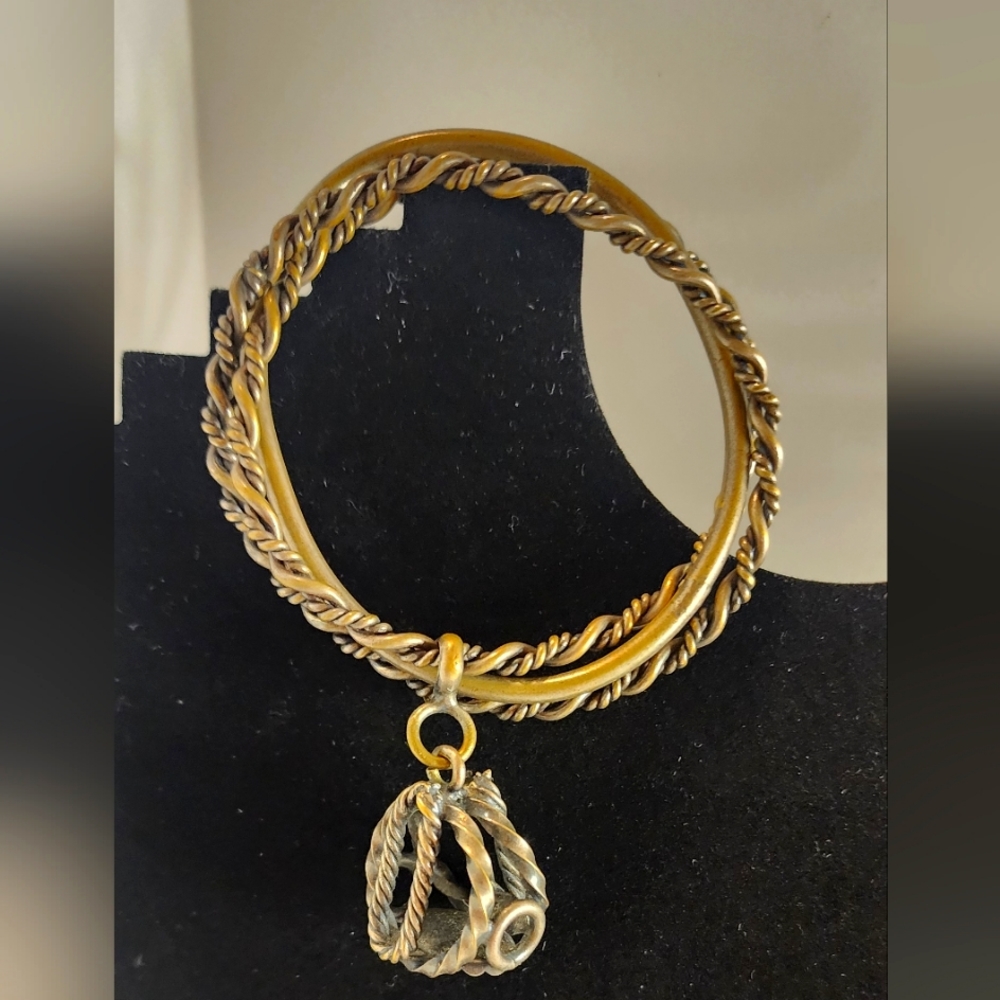 2 bracelets and necklace